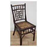 Antique bamboo side chair with caned seat