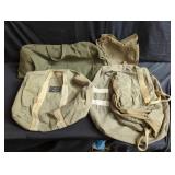 Group of vintage military dufflebags