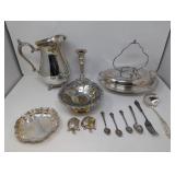 Group of silver plate pitcher, candlestick,