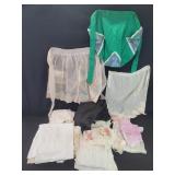 Large collection of half aprons long and short