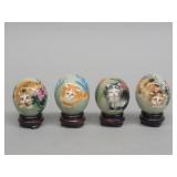 Four vintage hand painted stone eggs with cats