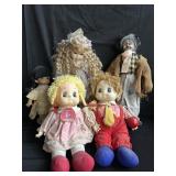 Group of five vintage ceramic and plush dolls