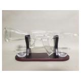 Ak-47 glass decanter on wood stand with glasses