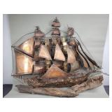Vintage brutalist copper and wood sailing ship