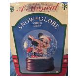 The Disney character collection mickey snow globe
