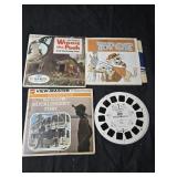 Lot of 4 view masters toy story, top cat, winnie