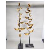 Pair of gilt and black metal tree decorations