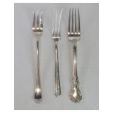 Three sterling silver forks