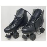 Vintage Dominion leather and metal roller skates