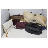 Group of leather and fabric handbags