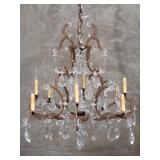 Vintage iron chandelier with glass ornaments