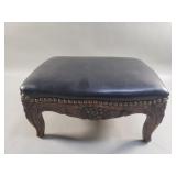 Vintage upholstered footstool