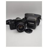 Canon F-1 35mm SLR camera and leather case