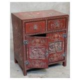 Chinese red lacquered and carved wood chest with