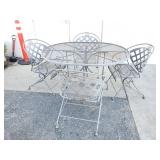 Vintage wrought iron patio table and chairs