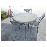 Vintage wrought iron patio table and chairs