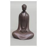 Cast-iron Buddha figure