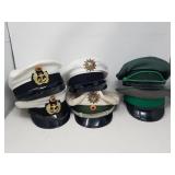 Group of miltary prop hats