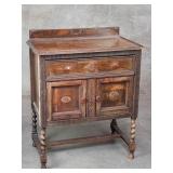 Antique carved oak cabinet with barley twist legs