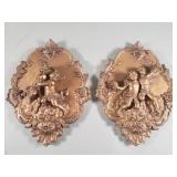 Pair of vintage chalk cherub plaques
