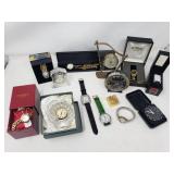 Group of quartz and windup clocks, wristwatch