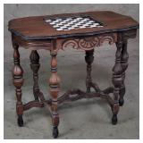 1930s carved walnut table with onyx chessboard