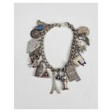 Sterling silver charm bracelet with some sterling