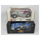 2 die-cast metal Burago model cars