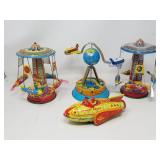 Group of reproduction tin wind-up toys