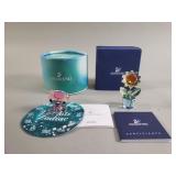 Pair of Swarovski crystal pig figurine and flower