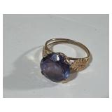 14k gold ring with purple topaz stone