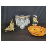 Box of miscellaneous brass tribal style figure,