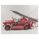Pair of vintage metal toy fire trucks