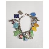 Sterling silver charm bracelet ï¿½ most charms are