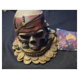 Pirates of the Caribbean coin bank with coins