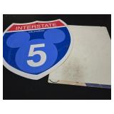 Disney interstate 5 sign and Pinocchio poster