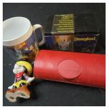 Lot of 4 Disney collectibles cup, jewelry and more