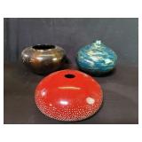 Three contemporary composite vases