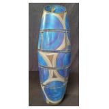 Hand blown and hand decorated vase.