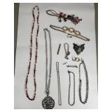 Costume jewelry necklaces, earrings, brooches,