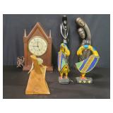 Five carved wood figures and a General Electric