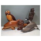 Group of carved wood figurines and plaques