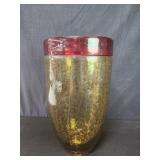 Red wearhered art glass vase