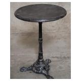 Vintage iron base bistro table with wood top