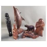 Group of carved wood figurines and burl wood
