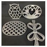 Group of pewter trivets