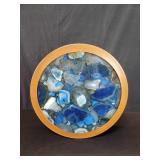 Blue agate wall decoration incased in a metal