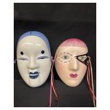 Pair of vintage decorative porcelain wall masks