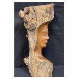 Vintage hand-carved sculpture of a woman profile