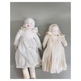 Pair of vintage porcelain baby dolls